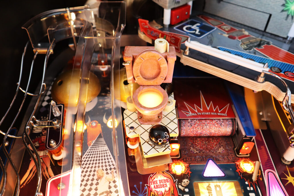 The Big Lebowski Toilet Scoop by The Art of Pinball